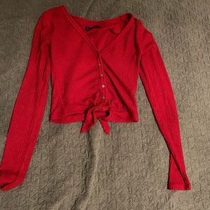 Red long sleeve cropped with tie in front
